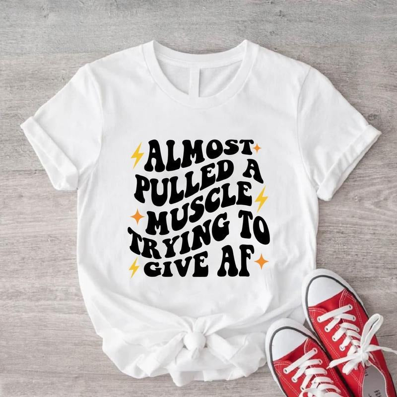 Almost Pulled Muscle Trying Give AF Gym Funny Sayings - Adult & Kids T-Shirts, Sweatshirts & Hoodies apparel design preview 1
