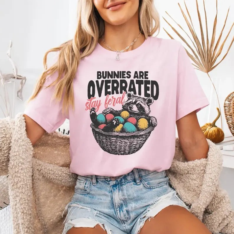 Bunnies Are Overrated Stay Feral Funny Easter Raccoon - Adult & Kids T-Shirts, Sweatshirts & Hoodies apparel design preview 1