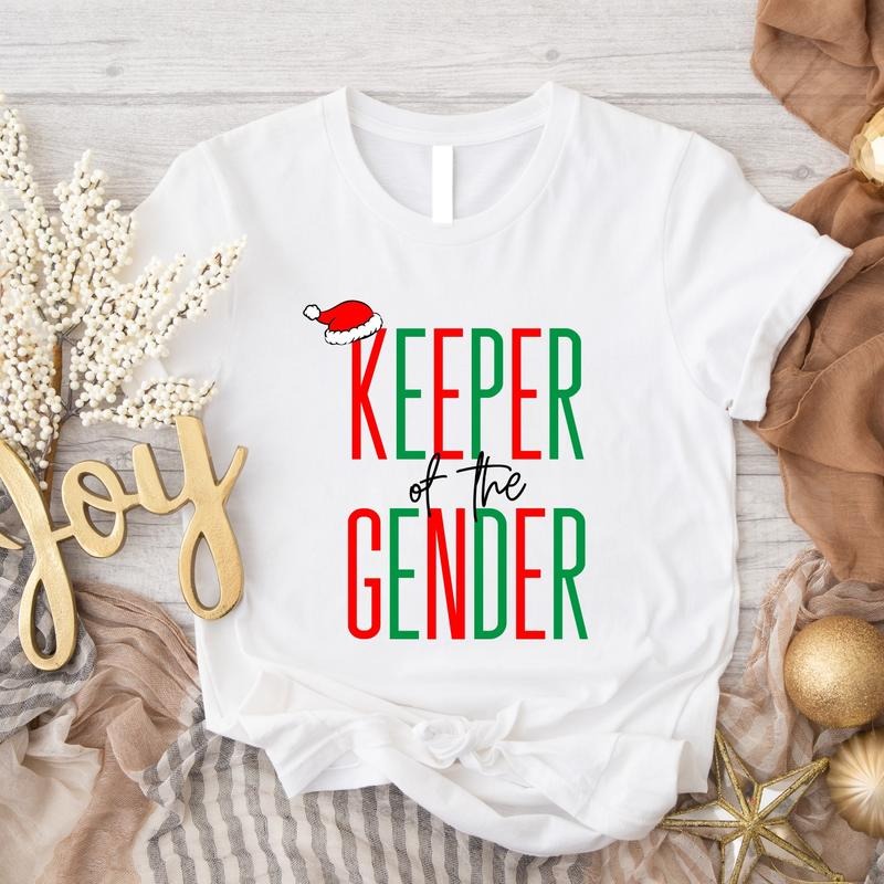 Keeper Gender Xmas Baby Announcement Matching Reveal - Adult & Kids T-Shirts, Sweatshirts & Hoodies apparel design preview 1