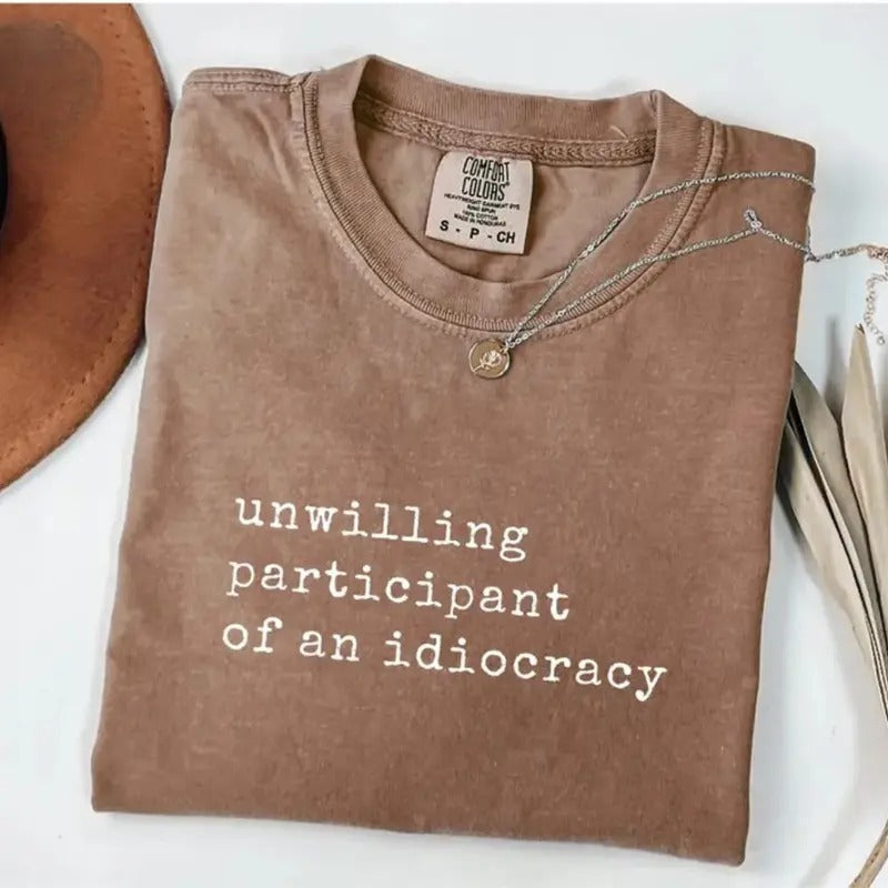 Comfort Colors Unwilling Participant Idiocracy - Adult & Kids T-Shirts, Sweatshirts & Hoodies apparel design preview 1