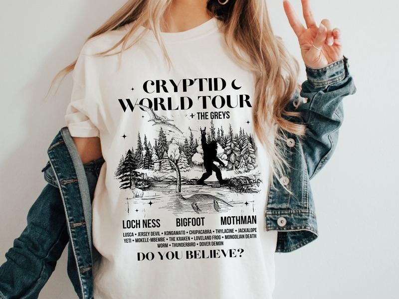 Cryptid World Tour Cryptozoology Bigfoot Cryptidcore - Adult & Kids T-Shirts, Sweatshirts & Hoodies apparel design preview 1