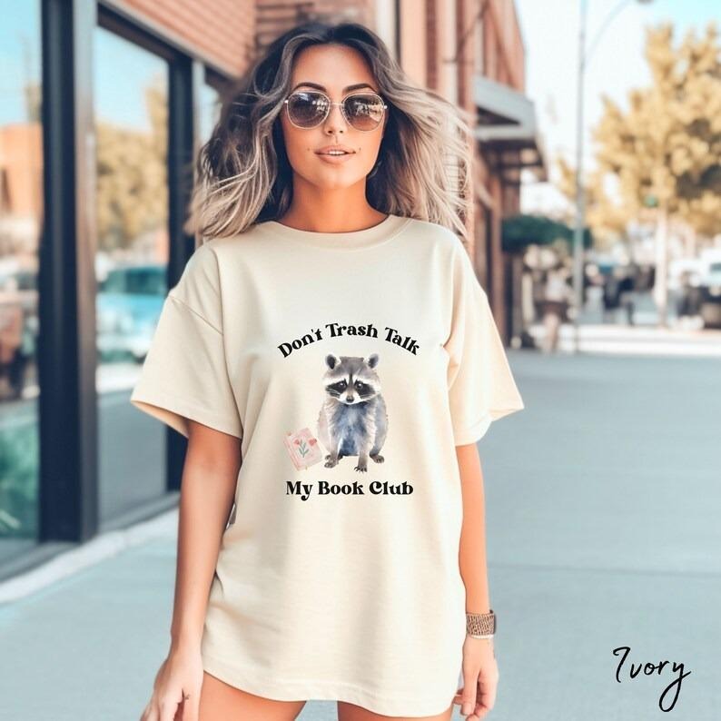 Cute Reading Raccoon Romantasy Reader Trash Panda - Adult & Kids T-Shirts, Sweatshirts & Hoodies apparel design preview 1