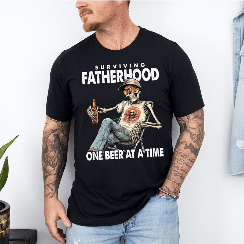 Funny Skeleton Surviving Fatherhood One Beer Time - Adult & Kids T-Shirts, Sweatshirts & Hoodies apparel design preview 1