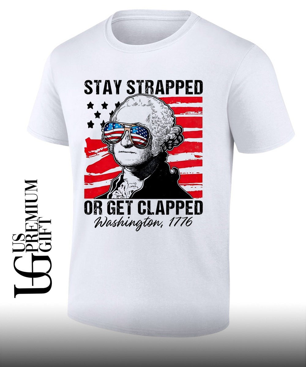 George Washington American Flag Stay Strapped or Get - Adult & Kids T-Shirts, Sweatshirts & Hoodies apparel design preview 1