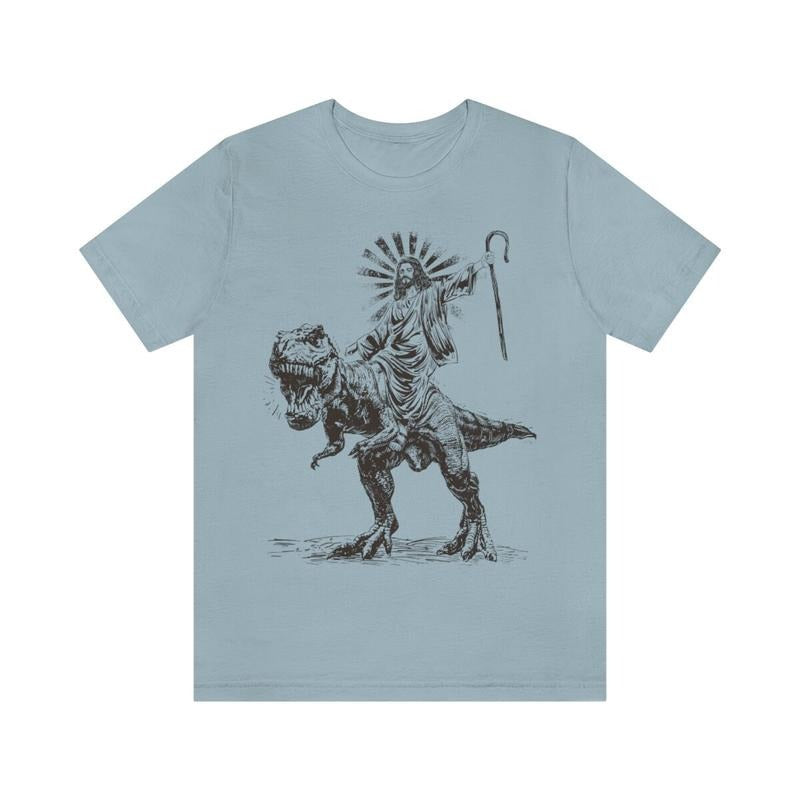 Jesus Riding T Rex Dinosaur Wild - Adult & Kids T-Shirts, Sweatshirts & Hoodies apparel design preview 1