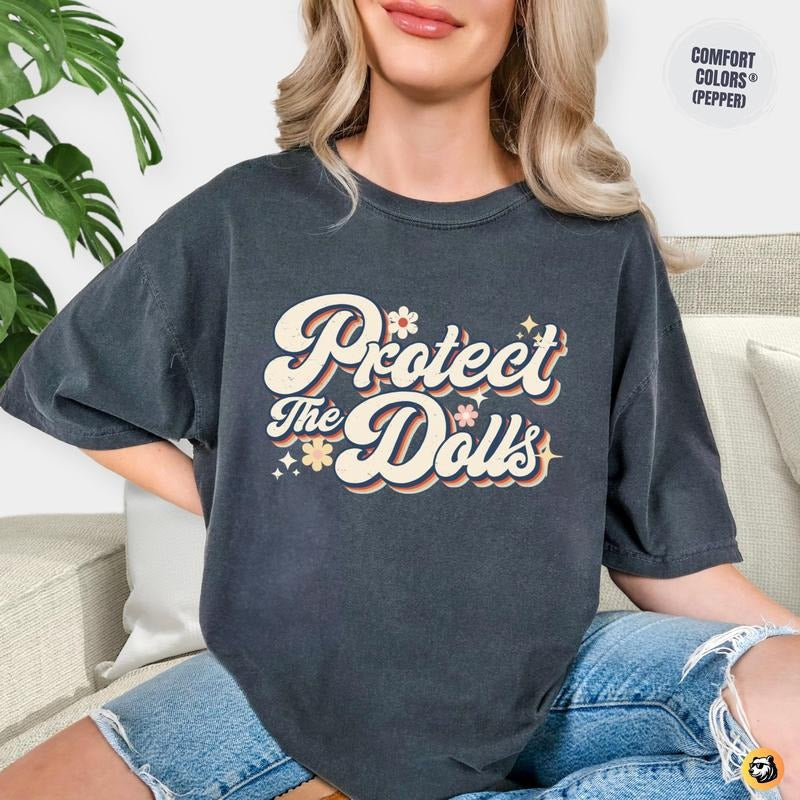 Protect Dolls Retro Groovy Trans Solidarity Gender - Adult & Kids T-Shirts, Sweatshirts & Hoodies apparel design preview 1