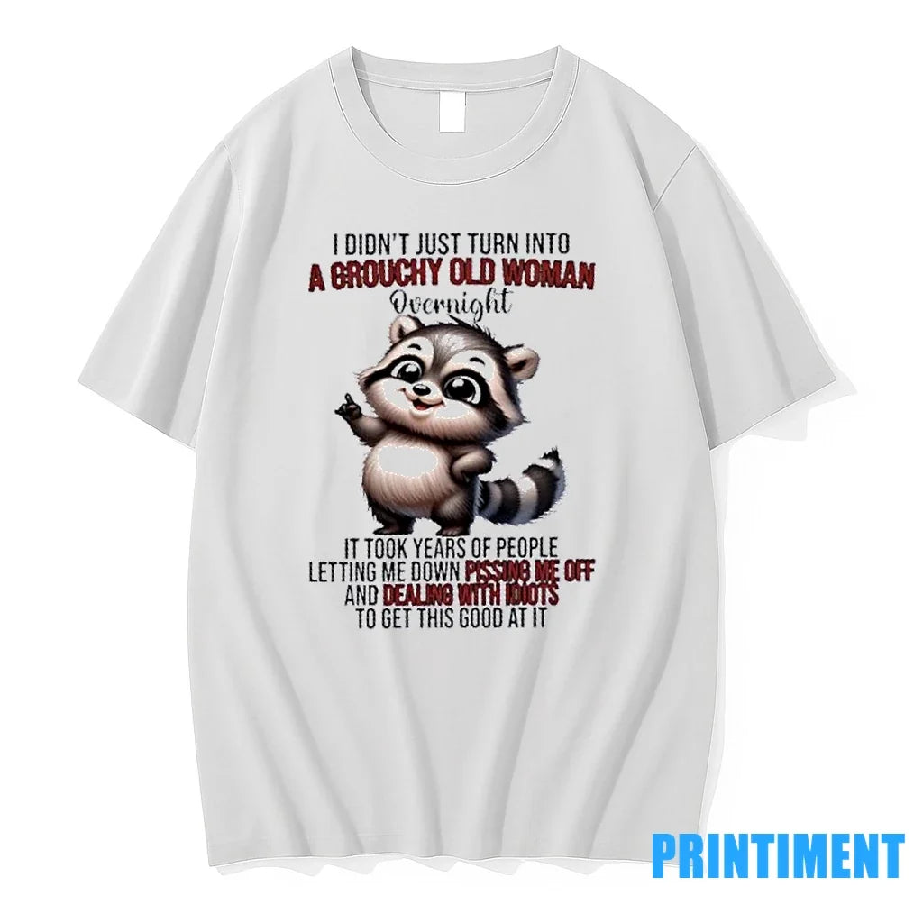 Raccoon I Didnt Just Turn Into A Grouchy Old Woman - Adult & Kids T-Shirts, Sweatshirts & Hoodies apparel design preview 1