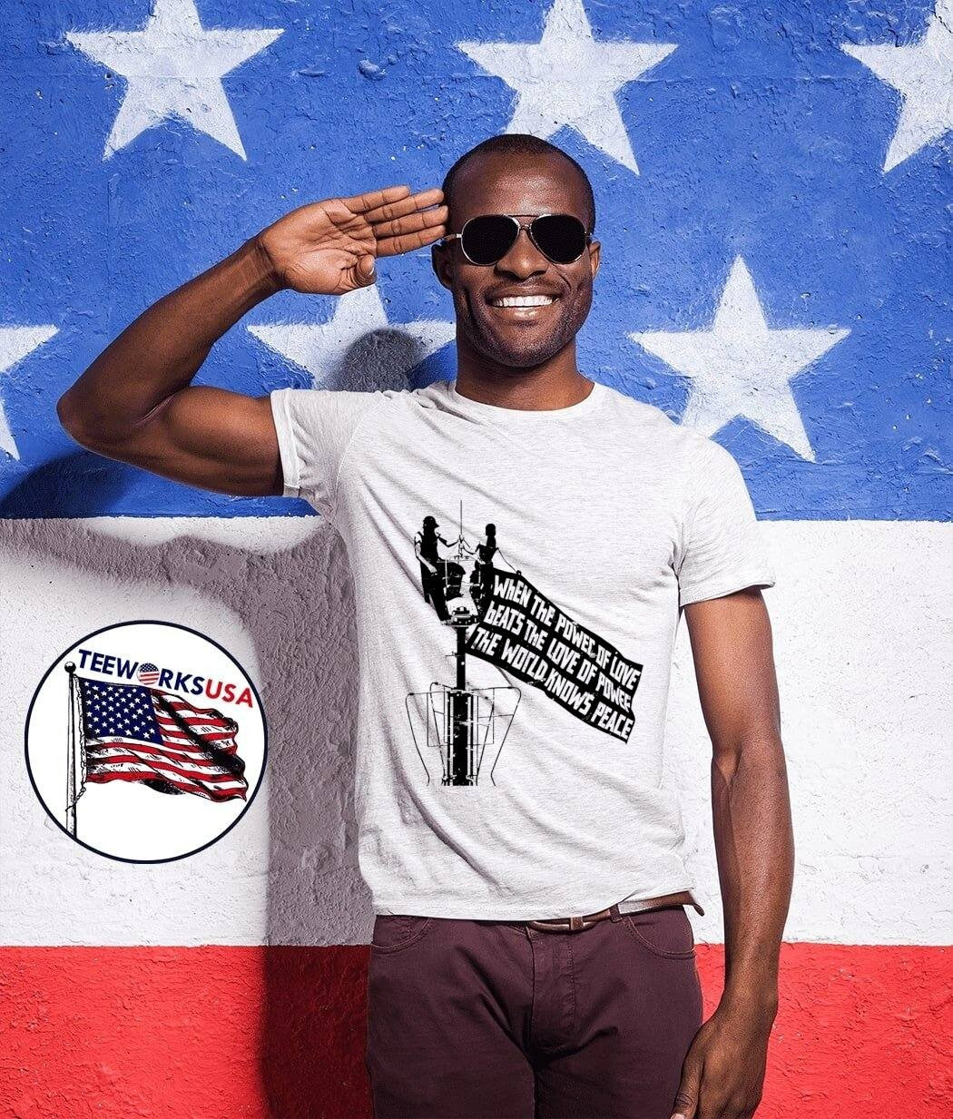 Shepard Fairey Protest Art People Standing on Antenna - Adult & Kids T-Shirts, Sweatshirts & Hoodies apparel design preview 1