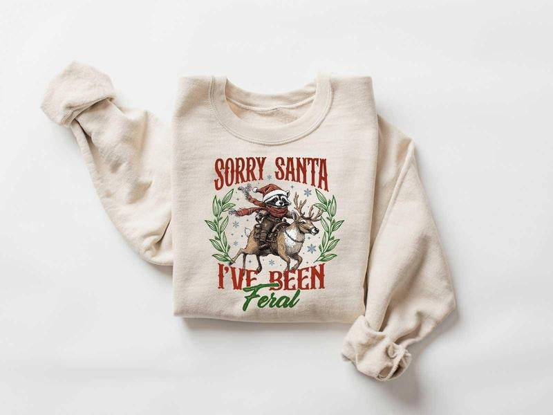 Sorry Santa I'Ve Been Feral Season Raccoon Funny Meme - Adult & Kids T-Shirts, Sweatshirts & Hoodies apparel design preview 1