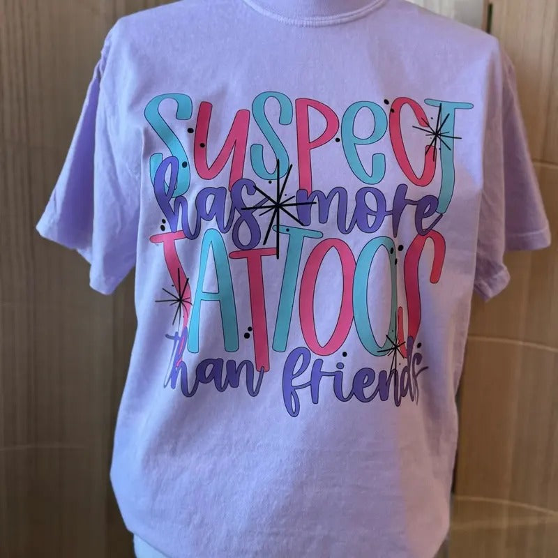Suspect Has More Tattoos Than Friends Comfort Colors - Adult & Kids T-Shirts, Sweatshirts & Hoodies apparel design preview 1