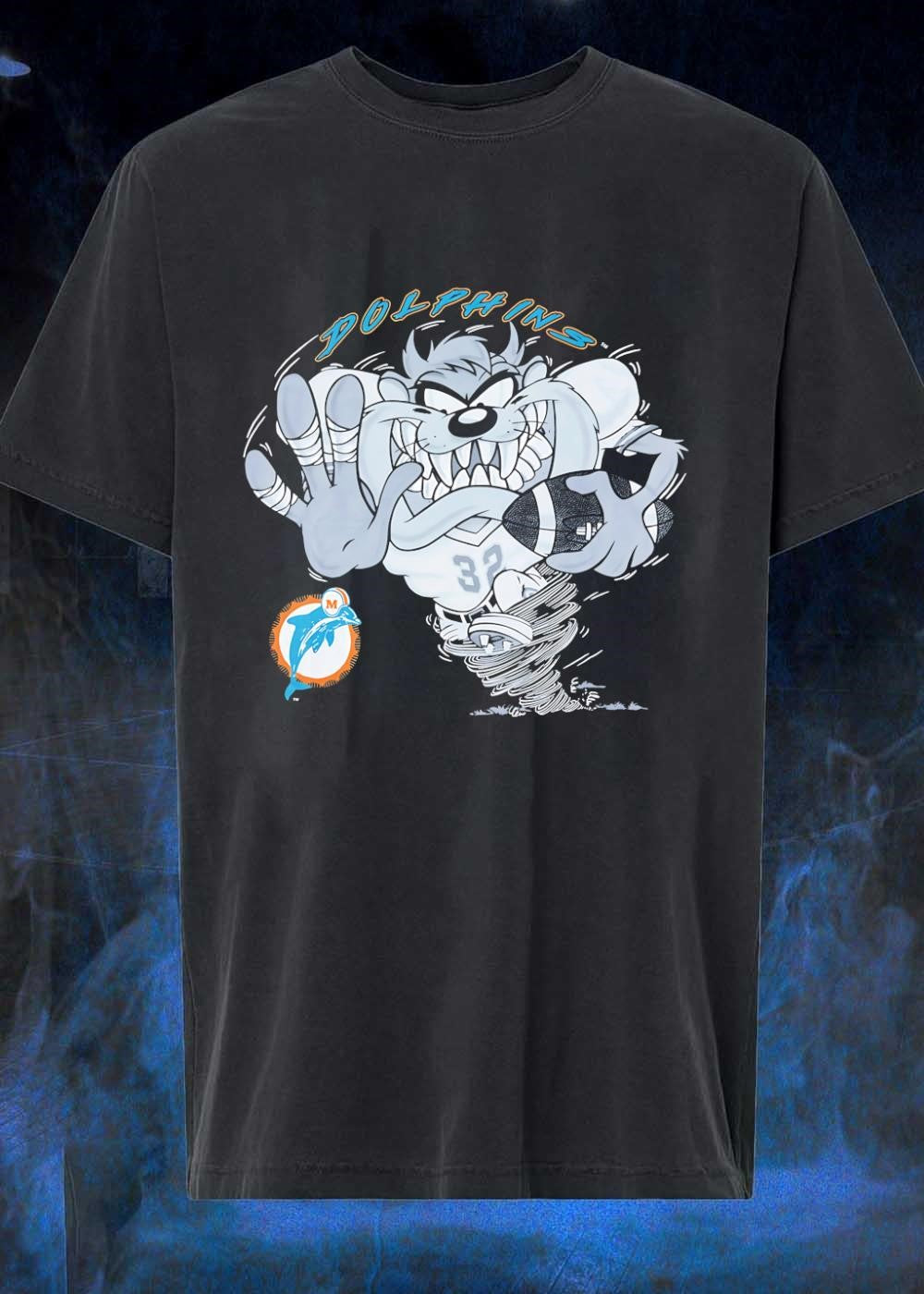 TM, Dolphins, Taz Playing Football, Miami - Adult & Kids T-Shirts, Sweatshirts & Hoodies apparel design preview 1