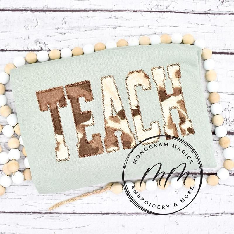 Teach Cow Print - Adult & Kids T-Shirts, Sweatshirts & Hoodies apparel design preview 1