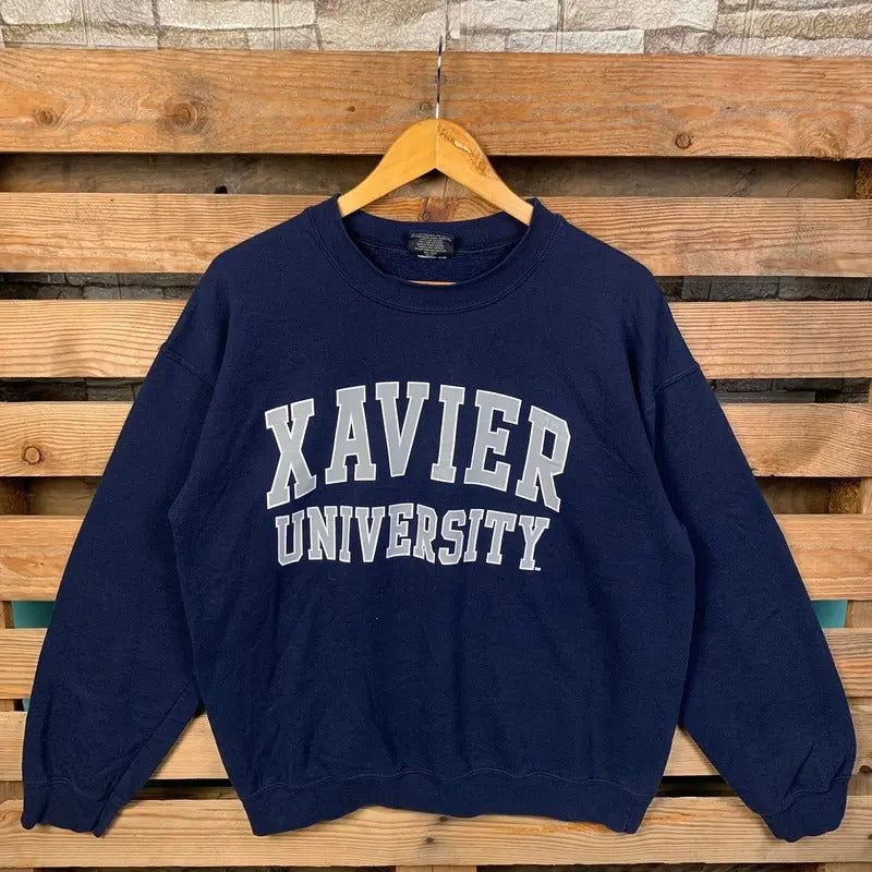 Vintage NCAA Xavier University Jumper Logo Print - Adult & Kids T-Shirts, Sweatshirts & Hoodies apparel design preview 1